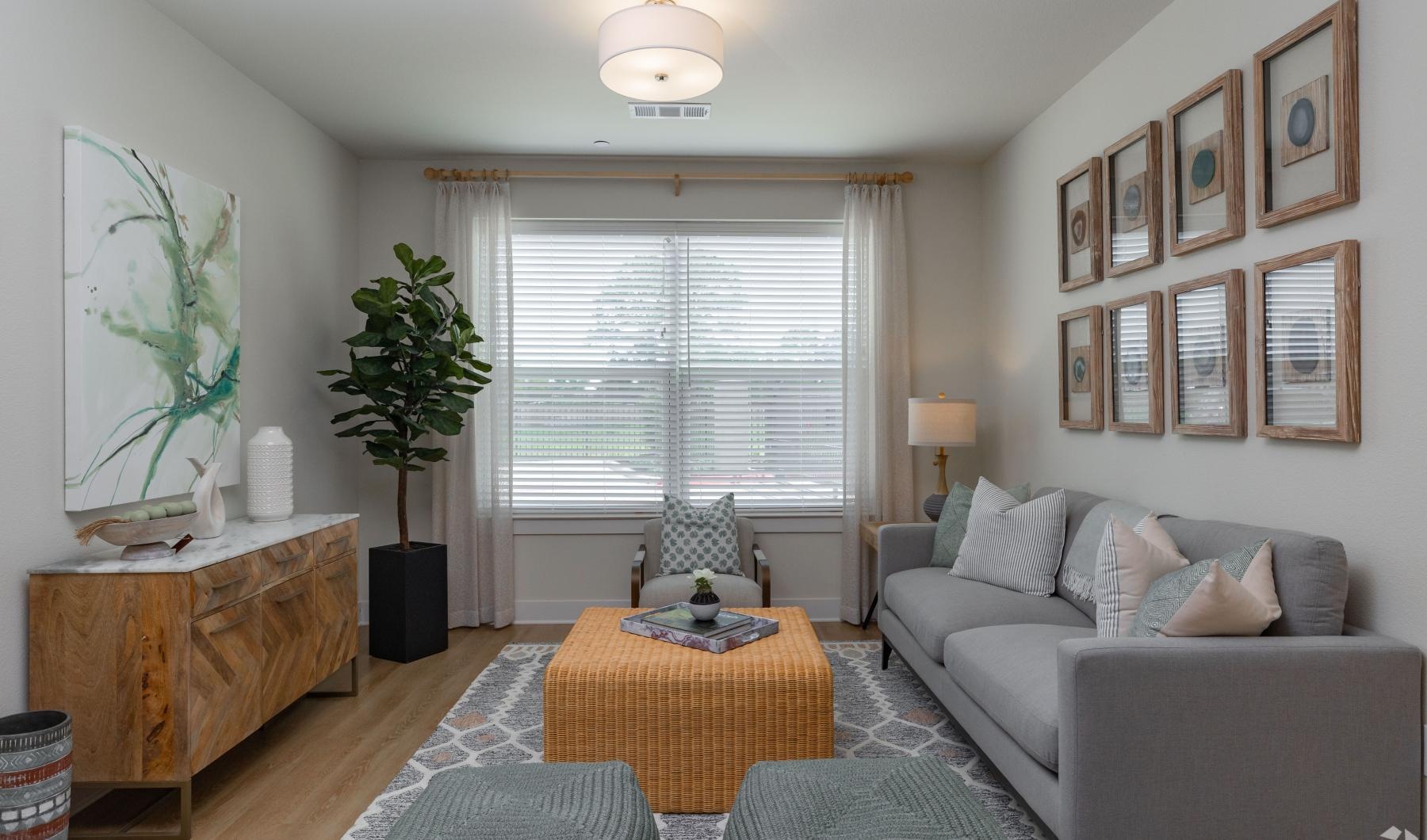 a living room with a couch and a table